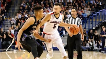Dec 7, 2016; Spokane, WA, USA; Gonzaga Bulldogs guard Nigel Williams-Goss (5) goes up against Washington Huskies guard Markelle Fultz (20) during the second half at McCarthey Athletic Center. The Bulldogs won 98-71. Mandatory Credit: James Snook-USA TODAY Sports