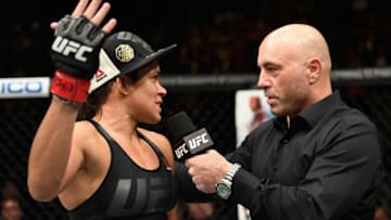 LAS VEGAS, NV - DECEMBER 30: (R-L) Joe Rogan interviews Amanda Nunes of Brazil after her victory over Ronda Rousey in their UFC women's bantamweight championship bout during the UFC 207 event at T-Mobile Arena on December 30, 2016 in Las Vegas, Nevada. (Photo by Josh Hedges/Zuffa LLC/Zuffa LLC via Getty Images)