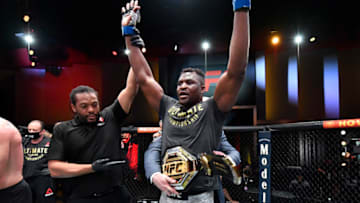 Mar 27, 2021; Las Vegas, NV, USA; Francis Ngannou of Cameroon reacts after his victory over Stipe Miocic in their UFC heavyweight championship fight during the UFC 260 event at UFC APEX on March 27, 2021 in Las Vegas, Nevada. Mandatory Credit: Jeff Bottari/Handout Photo via USA TODAY Sports
