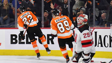 Dec 14, 2021; Philadelphia, Pennsylvania, USA; Philadelphia Flyers left wing Oskar Lindblom (23) celebrates his goal against New Jersey Devils goaltender Mackenzie Blackwood (29) during the second period at Wells Fargo Center. Mandatory Credit: Eric Hartline-USA TODAY Sports