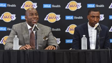EL SEGUNDO, CA- JULY 18: President of Basketball Operations, Magic Johnson and General Manager, Rob Pelinka introduce Kentavious Caldwell-Pope