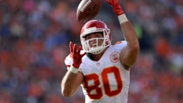 Sep 14, 2014; Denver, CO, USA; Kansas City Chiefs tight end Anthony Fasano (80) successfully pulls in a reception in the fourth quarter against the Denver Broncos at Sports Authority Field at Mile High. The Broncos defeated the Chiefs 24-17. Mandatory Credit: Ron Chenoy-USA TODAY Sports