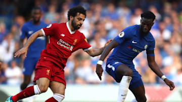 LONDON, ENGLAND - MAY 06: Mohamed Salah of Liverpool battles with Tiemoue Bakayoko of Chelsea during the Premier League match between Chelsea and Liverpool at Stamford Bridge on May 6, 2018 in London, England. (Photo by Julian Finney/Getty Images)
