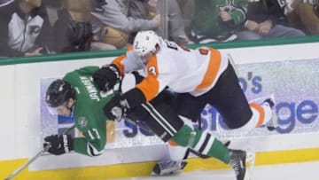 Dec 11, 2015; Dallas, TX, USA; Philadelphia Flyers defenseman Radko Gudas (3) checks Dallas Stars center Mattias Janmark (13) during the second period at the American Airlines Center. Mandatory Credit: Jerome Miron-USA TODAY Sports