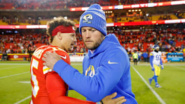 KANSAS CITY, MISSOURI - NOVEMBER 27: Patrick Mahomes #15 of the Kansas City Chiefs and Matthew Stafford #9 of the Los Angeles Rams greet after a game at Arrowhead Stadium on November 27, 2022 in Kansas City, Missouri. (Photo by David Eulitt/Getty Images)