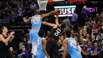 SACRAMENTO, CALIFORNIA - MARCH 01: Harry Giles III #20 of the Sacramento Kings blocks a shot from Landry Shamet #20 of the Los Angeles Clippers in a game at Golden 1 Center on March 01, 2019 in Sacramento, California. (Photo by Cassy Athena/Getty Images)