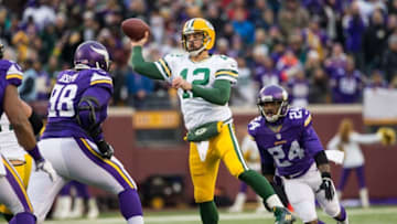 Nov 22, 2015; Minneapolis, MN, USA; Green Bay Packers quarterback Aaron Rodgers (12) throws during the second quarter against the Minnesota Vikings at TCF Bank Stadium. Mandatory Credit: Brace Hemmelgarn-USA TODAY Sports