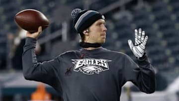 Jan 4, 2014; Philadelphia, PA, USA; Philadelphia Eagles quarterback Nick Foles warms up on the field prior to the Eagles