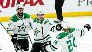 ST. LOUIS, MO - APRIL 27: Dallas Stars' Miro Heiskanen, center, is congratulated after scoring a goal by Alexander Radulov, left, and Roope Hintz, right, during the first period of Game 2 of an NHL Western Conference second-round playoff series between the St. Louis Blues and the Dallas Stars on April 27, 2019, at the Enterprise Center in St. Louis, MO. (Photo by Tim Spyers/Icon Sportswire via Getty Images)