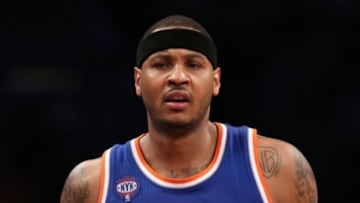 Feb 6, 2015; Brooklyn, NY, USA; New York Knicks forward Carmelo Anthony (7) reacts against the Brooklyn Nets during the third quarter at Barclays Center. The Nets defeated the Knicks 92-88. Mandatory Credit: Adam Hunger-USA TODAY Sports