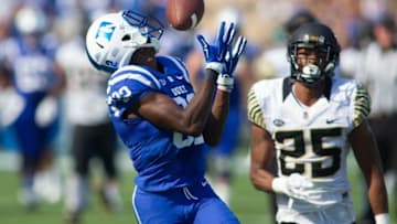 Sep 10, 2016; Durham, NC, USA; Duke Blue Devils running back Brittain Brown (22) catches a pass while Wake Forest Demon Deacons defensive back Brad Watson (25) during the second quarter at Wallace Wade Stadium. Mandatory Credit: Jeremy Brevard-USA TODAY Sports