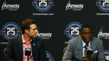 Jun 28, 2013; Orlando, FL, USA; Orlando Magic general manager Rob Hennigan (left) and first round draft pick Victor Oladipo (right) address the media during a press conference at the Amway Center. Mandatory Credit: Douglas Jones-USA TODAY Sports