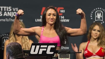 Mar 13, 2015; Dallas, TX, USA; Carla Esparza stands on the scales during weigh-ins for UFC 185 at Kay Bailey Hutchison Convention Center. Mandatory Credit: Tim Heitman-USA TODAY Sports
