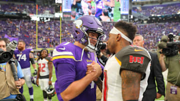 MINNEAPOLIS, MN - SEPTEMBER 24: Case Keenum #7 of the Minnesota Vikings and DeSean Jackson #11 of the Tampa Bay Buccaneers greet each other after the game on September 24, 2017 at U.S. Bank Stadium in Minneapolis, Minnesota. The Vikings defeated the Buccaneers 34-17. (Photo by Adam Bettcher/Getty Images)