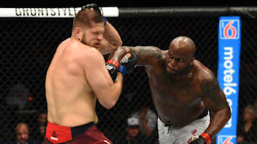 AUSTIN, TX - FEBRUARY 18: Derrick Lewis (R) punches Marcin Tybura of Poland in their heavyweight bout during the UFC Fight Night event at Frank Erwin Center on February 18, 2018 in Austin, Texas. (Photo by Josh Hedges/Zuffa LLC/Zuffa LLC via Getty Images)
