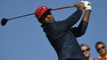US golfer Tony Finau plays a tee shot during his singles match with Europe's English golfer Tommy Fleetwood on the third day of the 42nd Ryder Cup at Le Golf National Course at Saint-Quentin-en-Yvelines, south-west of Paris, on September 30, 2018. (Photo by Eric FEFERBERG / AFP) (Photo credit should read ERIC FEFERBERG/AFP via Getty Images)
