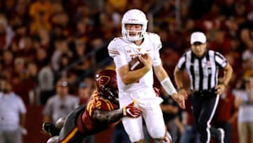 AMES, IA - SEPTEMBER 28: Quarterback Shane Buechele #7 of the Texas Longhorns is tackled by linebacker Willie Harvey #2 of the Iowa State Cyclones in the first half of play against the Iowa State Cyclones at Jack Trice Stadium on September 28, 2017 in Ames, Iowa. The Texas Longhorns won 17-7 over the Iowa State Cyclones. (Photo by David K Purdy/Getty Images)