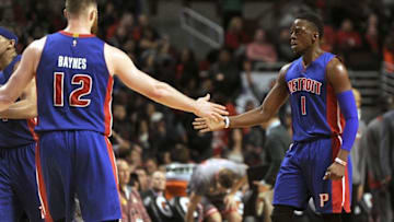 Apr 2, 2016; Chicago, IL, USA; Detroit Pistons guard Reggie Jackson (1) and Detroit Pistons center Aron Baynes (12) at the end of the second half against the Chicago Bulls at the United Center. The Detroit Pistons beat the Chicago Bulls 94-90. Mandatory Credit: Matt Marton-USA TODAY Sports