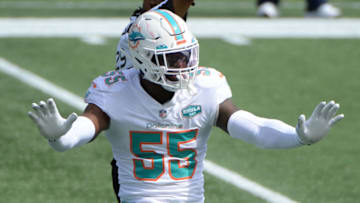 FOXBOROUGH, MASSACHUSETTS - SEPTEMBER 13: Jerome Baker #55 of the Miami Dolphins celebrates sacking Cam Newton #1 of the New England Patriots (not pictured) during the first half at Gillette Stadium on September 13, 2020 in Foxborough, Massachusetts. (Photo by Kathryn Riley/Getty Images)