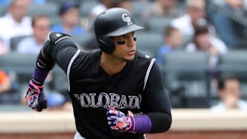 Jul 31, 2016; New York City, NY, USA; Colorado Rockies right fielder Carlos Gonzalez (5) heads out on his RBI double during the fifth inning against the New York Mets at Citi Field. New York Mets won 6-4. Mandatory Credit: Anthony Gruppuso-USA TODAY Sports