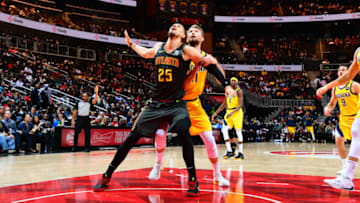 ATLANTA, GA - DECEMBER 13: Alex Len #25 of the Atlanta Hawks plays defense against the Indiana Pacers on December 13, 2019 at State Farm Arena in Atlanta, Georgia. NOTE TO USER: User expressly acknowledges and agrees that, by downloading and/or using this Photograph, user is consenting to the terms and conditions of the Getty Images License Agreement. Mandatory Copyright Notice: Copyright 2019 NBAE (Photo by Scott Cunningham/NBAE via Getty Images)