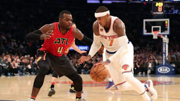 Nov 20, 2016; New York, NY, USA; New York Knicks forward Carmelo Anthony (7) drives past Atlanta Hawks forward Paul Millsap (4) during the first quarter at Madison Square Garden. Mandatory Credit: Anthony Gruppuso-USA TODAY Sports