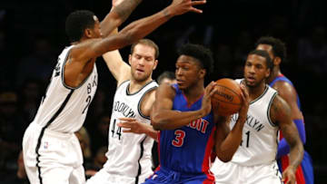 Nov 29, 2015; Brooklyn, NY, USA; Brooklyn Nets guard Rondae Hollis-Jefferson (24), guard Bojan Bogdanovic (44) and forward Thomas Robinson (41) defend against Detroit Pistons forward Stanley Johnson (3) during first half at Barclays Center. Mandatory Credit: Noah K. Murray-USA TODAY Sports