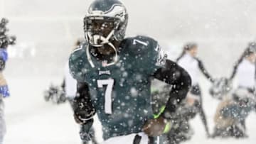 Dec 8, 2013; Philadelphia, PA, USA; Philadelphia Eagles quarterback Michael Vick (7) runs onto the field prior to the game against the Detroit Lions at Lincoln Financial Field. The Eagles defeated the Lions 34-20. Mandatory Credit: Howard Smith-USA TODAY Sports