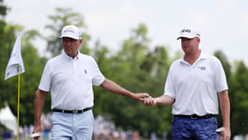AVONDALE, LOUISIANA - APRIL 26: Davis Love III and Dru Love of the United States react to a putt on the 10th green during the second round of the Zurich Classic at TPC Louisiana on April 26, 2019 in Avondale, Louisiana. (Photo by Rob Carr/Getty Images)