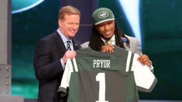 May 8, 2014; New York, NY, USA; Calvin Pryor (Louisville) poses for a photo with commissioner Roger Goodell after being selected as the number eighteen overall pick in the first round of the 2014 NFL Draft to the New York Jets at Radio City Music Hall. Mandatory Credit: Brad Penner-USA TODAY Sports