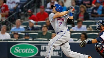 Apr 22, 2016; Atlanta, GA, USA; New York Mets catcher Travis d'Arnaud (7) swings against the Atlanta Braves in the second inning at Turner Field. Mandatory Credit: Brett Davis-USA TODAY Sports