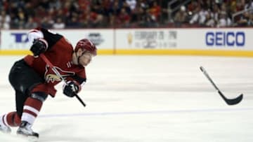 Feb 4, 2016; Glendale, AZ, USA; Arizona Coyotes left wing Mikkel Boedker (89) breaks his stick on a shot attempt against the Chicago Blackhawks during the second period at Gila River Arena. Mandatory Credit: Joe Camporeale-USA TODAY Sports