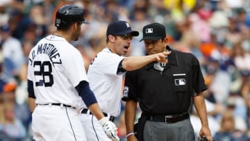 May 7, 2016; Detroit, MI, USA; Detroit Tigers manager Brad Ausmus (7) argues a call with umpire Alfonso Marquez (R) during the eighth inning against the Texas Rangers at Comerica Park. Mandatory Credit: Rick Osentoski-USA TODAY Sports
