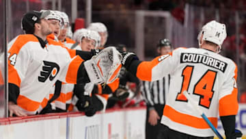 WASHINGTON, DC - FEBRUARY 08: Sean Couturier #14 of the Philadelphia Flyers celebrates with his teammates after scoring a goal against the Washington Capitals in the second period at Capital One Arena on February 08, 2020 in Washington, DC. (Photo by Patrick McDermott/NHLI via Getty Images)