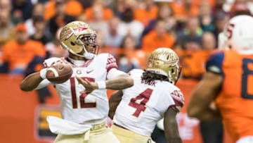 SYRACUSE, NY - NOVEMBER 19: Deondre Francois #12 of the Florida State Seminoles drops back to pass during the first half against the Syracuse Orange on November 19, 2016 at The Carrier Dome in Syracuse, New York. (Photo by Brett Carlsen/Getty Images)