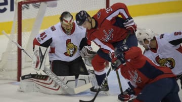 WASHINGTON DC - NOVEMBER 22: Washington right wing Alex Chiasson (39), center, tries to play the rebound off of Ottawa goalie Craig Anderson (41) as the Washington Capitals play the Ottawa Senators in Washington DC on November 22, 2017 . (Photo by John McDonnell/The Washington Post via Getty Images)