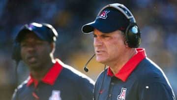 Nov 21, 2015; Tempe, AZ, USA; Arizona Wildcats head coach Rich Rodriguez walks on the sideline during the third quarter of the territorial cup against the Arizona State Sun Devils at Sun Devil Stadium. The Sun Devils won 52-37. Mandatory Credit: Casey Sapio-USA TODAY Sports