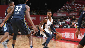 LAS VEGAS, NV - JULY 14: Trey Lewis #34 of the Utah Jazz handles the ball against the Memphis Grizzlies during the 2018 Las Vegas Summer League on July 14, 2018 at the Thomas & Mack Center in Las Vegas, Nevada. Copyright 2018 NBAE (Photo by Garrett Ellwood/NBAE via Getty Images)