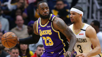 NEW ORLEANS, LOUISIANA - MARCH 01: LeBron James #23 of the Los Angeles Lakers drives against Josh Hart #3 of the New Orleans Pelicans (Photo by Jonathan Bachman/Getty Images)
