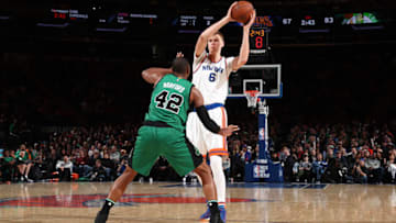 NEW YORK, NY - APRIL 2: Kristaps Porzingis #6 of the New York Knicks handles the ball during a game against the Boston Celtics on April 2, 2017 at Madison Square Garden in New York City, New York. NOTE TO USER: User expressly acknowledges and agrees that, by downloading and/or using this photograph, user is consenting to the terms and conditions of the Getty Images License Agreement. Mandatory Copyright Notice: Copyright 2017 NBAE (Photo by Nathaniel S. Butler/NBAE via Getty Images)
