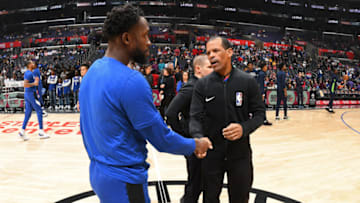 LOS ANGELES, CA - FEBRUARY 1: Patrick Beverley #21 of the LA Clippers shakes the hand of NBA Offical Eric Lewis before the game against the Minnesota Timberwolves on February 01, 2020 at STAPLES Center in Los Angeles, California. NOTE TO USER: User expressly acknowledges and agrees that, by downloading and/or using this Photograph, user is consenting to the terms and conditions of the Getty Images License Agreement. Mandatory Copyright Notice: Copyright 2020 NBAE (Photo by Adam Pantozzi/NBAE via Getty Images)