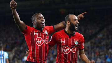 HUDDERSFIELD, ENGLAND - DECEMBER 22: Michael Obafemi of Southampton celebrates after scoring his team's third goal with Nathan Redmond of Southampton during the Premier League match between Huddersfield Town and Southampton FC at John Smith's Stadium on December 22, 2018 in Huddersfield, United Kingdom. (Photo by Nathan Stirk/Getty Images)