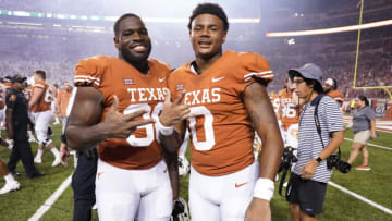 Ja'Tavion Sanders, Moro Ojomo, Texas Football. Mandatory Credit: Scott Wachter-USA TODAY Sports