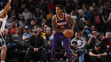 DENVER, CO - JANUARY 3: Marquese Chriss #0 of the Phoenix Suns looks to pass the ball against the Denver Nuggets on January 3, 2018 at the Pepsi Center in Denver, Colorado. NOTE TO USER: User expressly acknowledges and agrees that, by downloading and/or using this Photograph, user is consenting to the terms and conditions of the Getty Images License Agreement. Mandatory Copyright Notice: Copyright 2018 NBAE (Photo by Garrett Ellwood/NBAE via Getty Images)