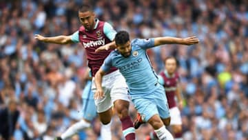 MANCHESTER, ENGLAND - AUGUST 28: Sergio Aguero of Manchester City is challenged by Winston Reid of West Ham United during the Premier League match between Manchester City and West Ham United at Etihad Stadium on August 28, 2016 in Manchester, England. (Photo by Gareth Copley/Getty Images)
