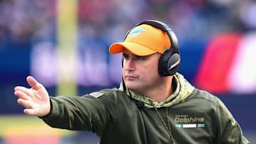 FOXBORO, MA - NOVEMBER 26: Special Teams Coordinator and Assistant Head Coach Darren Rizzi of the Miami Dolphins reacts during the first quarter of a game against the New England Patriots at Gillette Stadium on November 26, 2017 in Foxboro, Massachusetts. (Photo by Adam Glanzman/Getty Images)