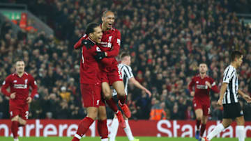 LIVERPOOL, ENGLAND - DECEMBER 26: Fabinho of Liverpool celebrates after scoring his team's fourth goal with team mate Virgil van Dijk during the Premier League match between Liverpool FC and Newcastle United at Anfield on December 26, 2018 in Liverpool, United Kingdom. (Photo by Jan Kruger/Getty Images)