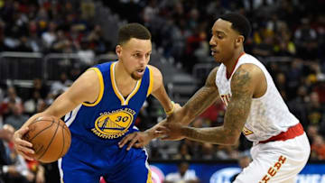 Feb 22, 2016; Atlanta, GA, USA; Golden State Warriors guard Stephen Curry (30) is defended by Atlanta Hawks guard Jeff Teague (0) during the first half at Philips Arena. Mandatory Credit: Dale Zanine-USA TODAY Sports