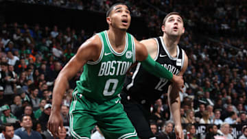 BROOKLYN, NY - NOVEMBER 14: Jayson Tatum #0 of the Boston Celtics boxes out Joe Harris #12 of the Brooklyn Nets on November 14, 2017 at Barclays Center in Brooklyn, New York. NOTE TO USER: User expressly acknowledges and agrees that, by downloading and or using this Photograph, user is consenting to the terms and conditions of the Getty Images License Agreement. Mandatory Copyright Notice: Copyright 2017 NBAE (Photo by Nathaniel S. Butler/NBAE via Getty Images)