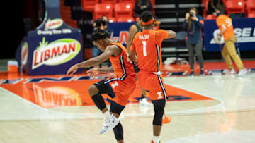 Nov 26, 2020; Champaign, Illinois, USA; Illinois Fighting Illini guard Adam Miller (left) celebrates his three point shot with Illini guard Trent Frazier (1) during the second half at the State Farm Center. Mandatory Credit: Patrick Gorski-USA TODAY Sports